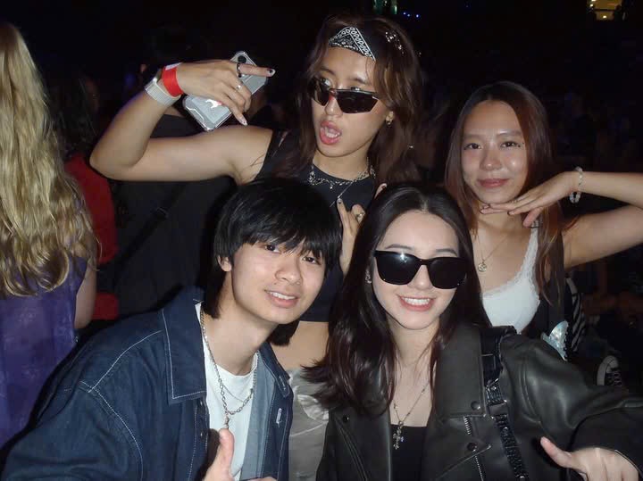 A group of friends posing together at a party